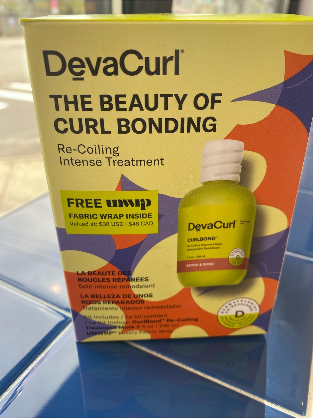 DevaCurl Curl Bonding Re-Coiling Treatment in free fabric wrap